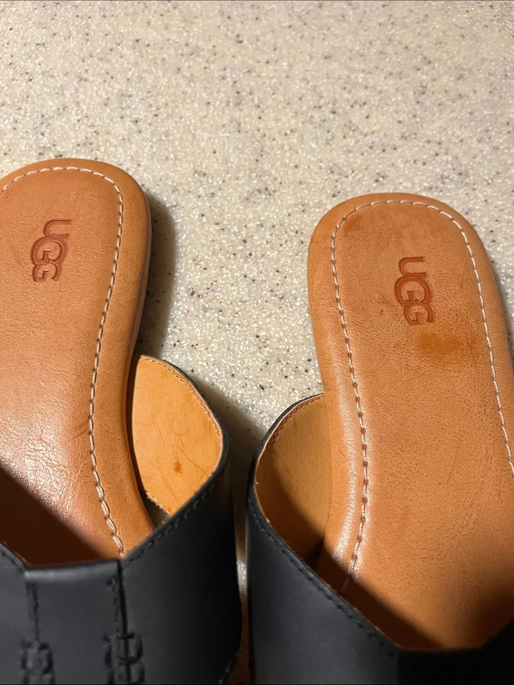 UGG Women’s Black and Tan Leather Toe-Post Sandals